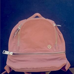Lululemon mini backpack. Pink. Super cute. Soft material.